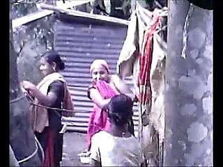 Desi stripe up of Teen Girls Bathing Open-air